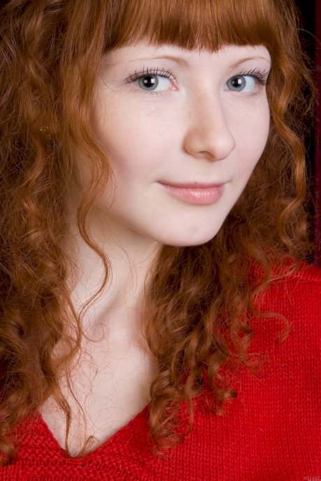 Curly-haired ginger Rochelle A strips naked & showcases her furry snatch