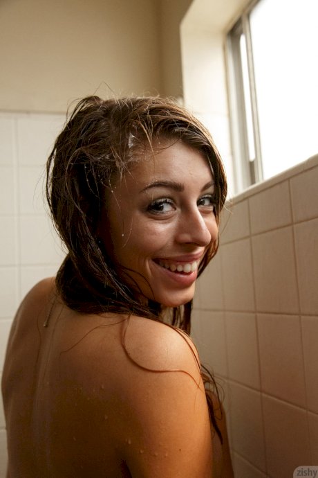 Hot babe Gracie Thibble treats herself to a hard breast massage in the shower