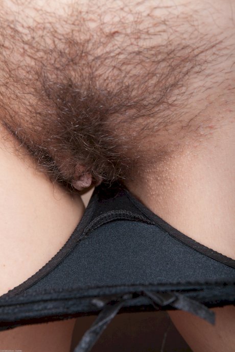 Sexy amateur wife Ellariya Rose reveals her hairy crotch and rides a sex toy