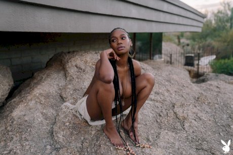 Beautiful ebony babe Nyla shows her juicy melons in a sexy outdoor striptease
