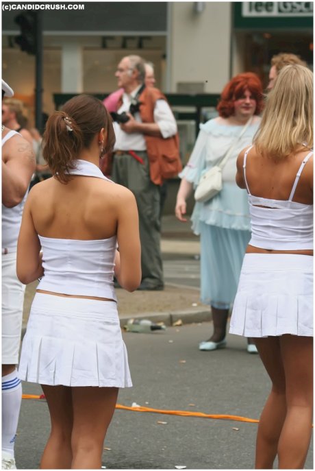 Teen girls at a street party are secretly recorded by a public voyeur