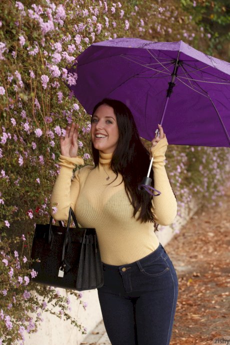 Curvaceous babe Angela White strips her bra and teases with her nips in public