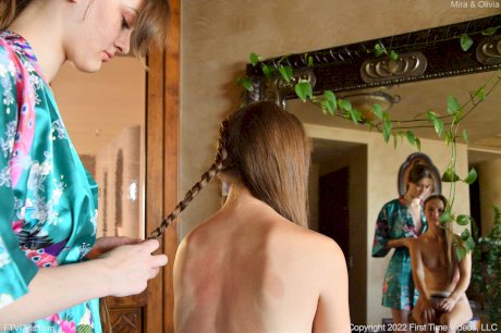 Tall lesbian Olivia does her short GF's hair & lets her toy with a vibrator