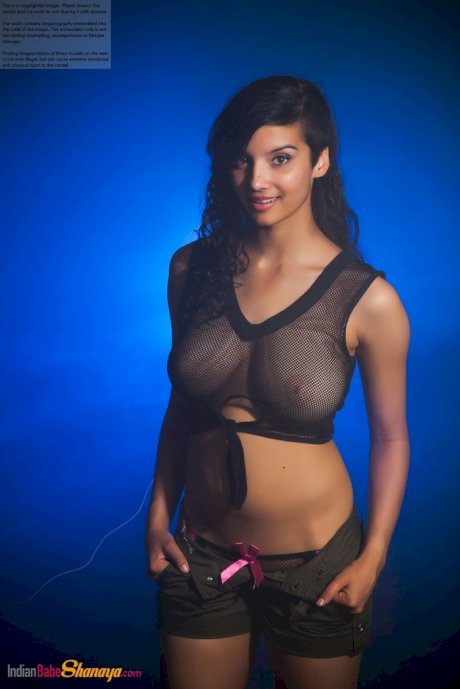 Indian female models non nude in a see thru top and shorts