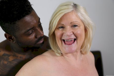 Big-breasted granny Lacey Starr ends wild interracial action with a facial