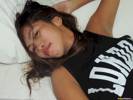 Tattooed Filipina Shonelle strips down naked and teases a big dick in POV