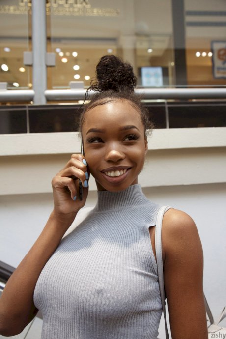 Sexy braless ebony teen Asia Amour getting naughty at the store