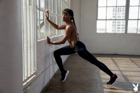 Hot black girl Ana Foxxx touts her phat ass during Playboy centerfold shoot