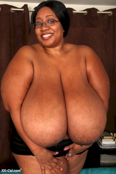 Brunette BBW in black lingerie Cotton Candi exposing her massive saggy tits