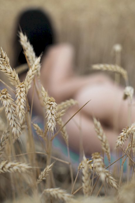 Breathtaking amateur babe Lyalya massages her big tits in a wheat field