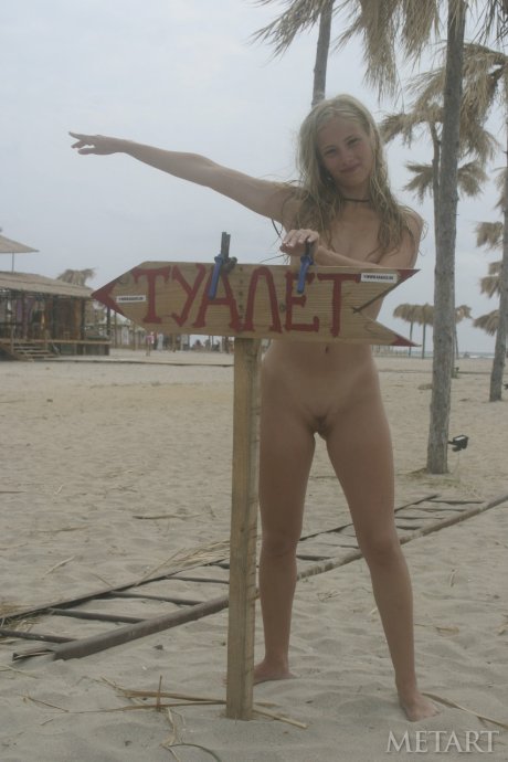 Amateur girlfriend Luba B flaunts her nude body on the sandy beach