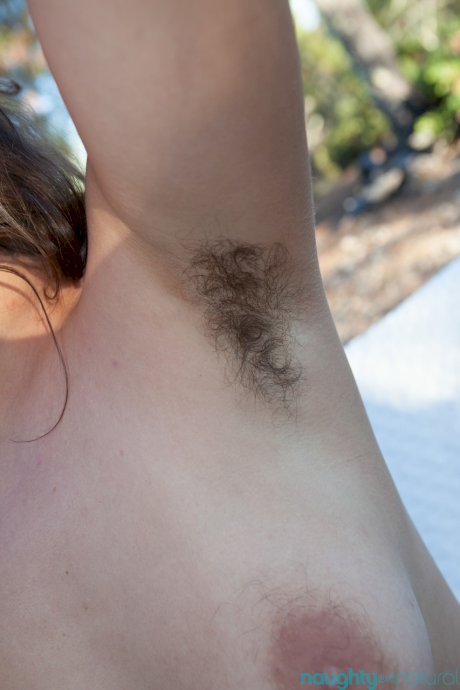 Amateur wife Nikki Silver fingers her bushy clam while exposing her hairy body