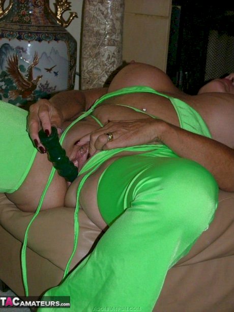 Chubby mature blonde Adonna dildo fucks her pierced pussy during solo action