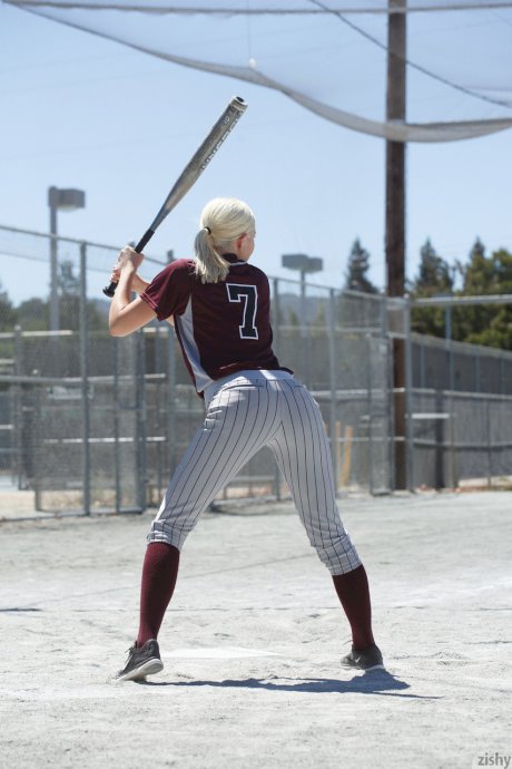 Sporty blonde Morgan Attwood flashing tiny tits & hot ass in a softball field