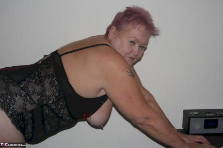 Overweight granny Valgasmic Exposed sheds her lingerie to pose nude in hosiery