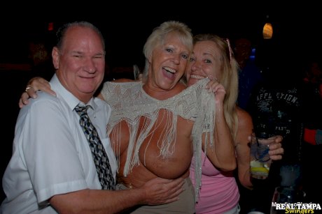 Amateur swinger Tracy Lick and her girls play with horny guys in a night club