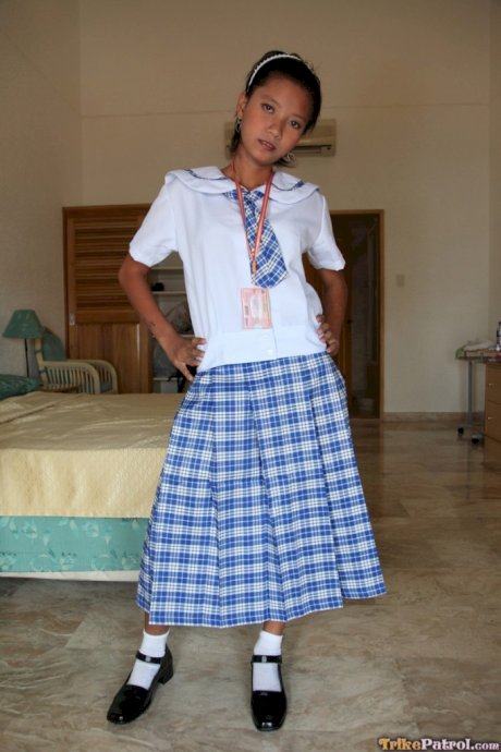 Petite Filipina schoolgirl Sally in uniform flashes panty upskirt & teen pussy