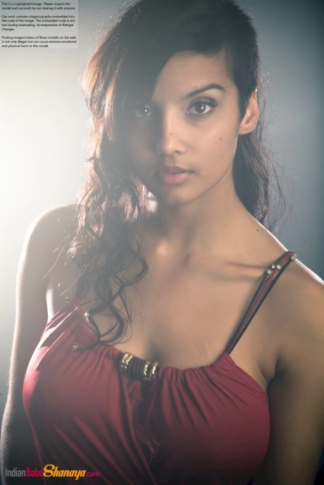 Beautiful Desi female removes her dress to expose her big natural boobs