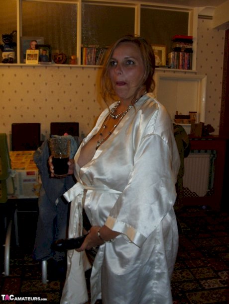 Fat old women use a strapon cock during the course of a threesome