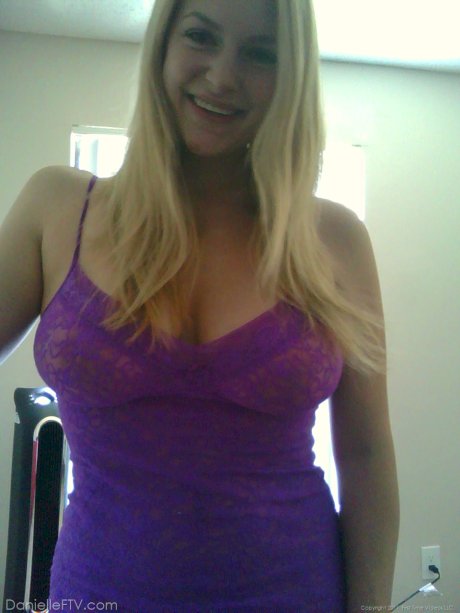 Blonde amateur Danielle takes sexy selfies around her home in a SFW manner