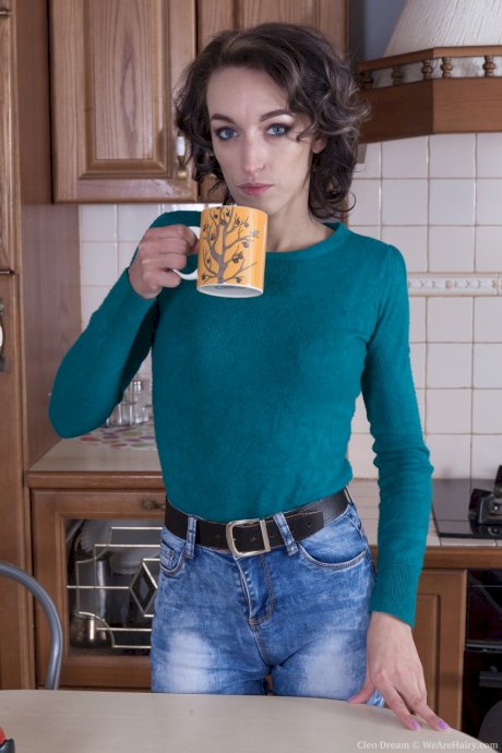 Skinny brunette Cleo Dream shows her hairy clam while home alone