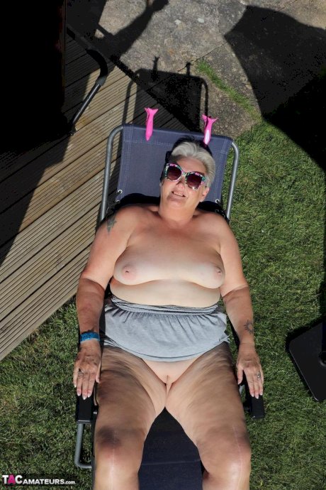 Fat nan Valgasmic Exposed shows her tits and snatch on a backyard lounge chair