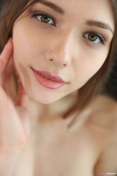 Ukrainian teen with big tits Mila Azul strips & poses naked by the window