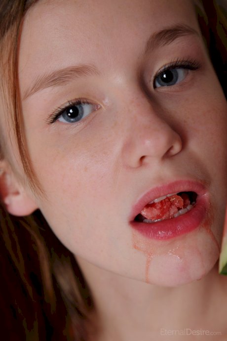 Sweet young Emily Bloom gets watermelon juice on her cute face & shaved pussy