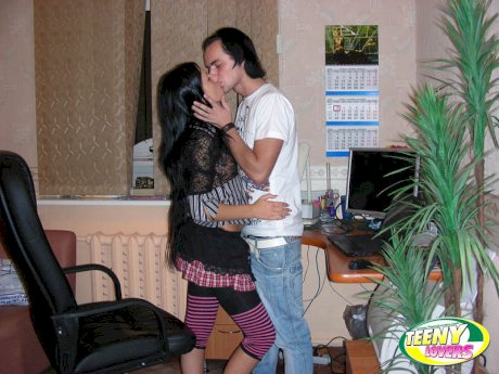Young brunette and her man friend undress before before office sex