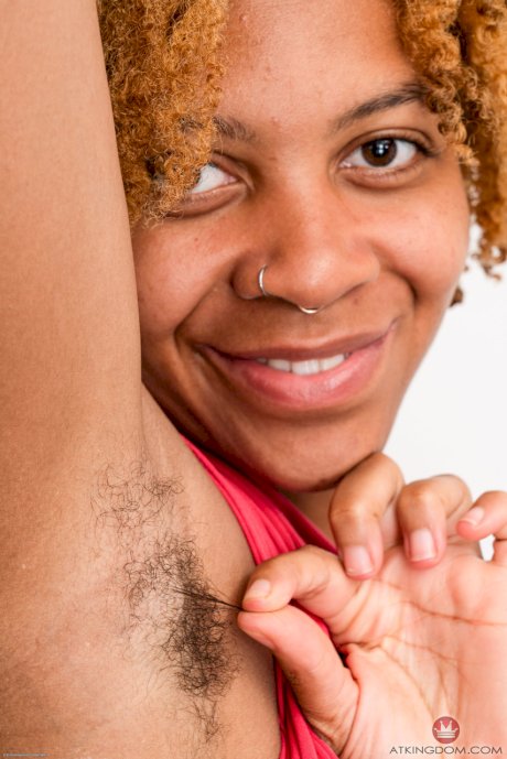 Wild ebony babe Oya playing with her hairy pussy & showing her big ass