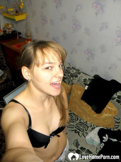 Hot teen with natural tits undresses and takes sexy homemade selfies