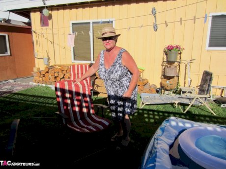 Fatty mature granny Girdle Goddess peels to enjoy wading pool skinny dip