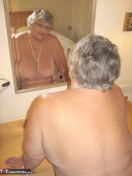 Fat British nan Grandma Libby completely disrobes while in a hotel room