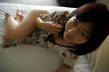 Saucy asian MILF strips down and gets her twat pleased with a vibrator