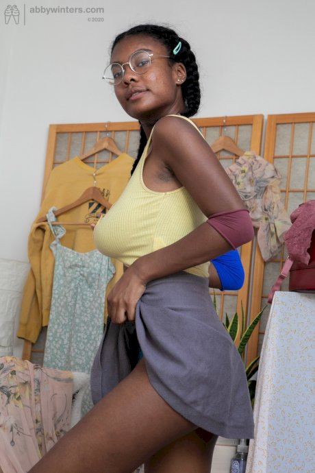 Pretty ebony girl Selena D showing her beautiful breasts & dark nipples