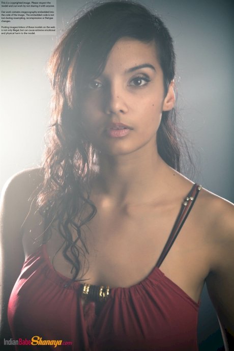 Beautiful Desi female removes her dress to expose her big natural boobs