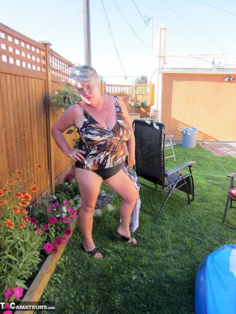 Fatty mature granny Girdle Goddess peels to enjoy wading pool skinny dip