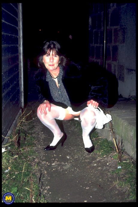 Mature escort Merel masturbates at home after having public sex with a client