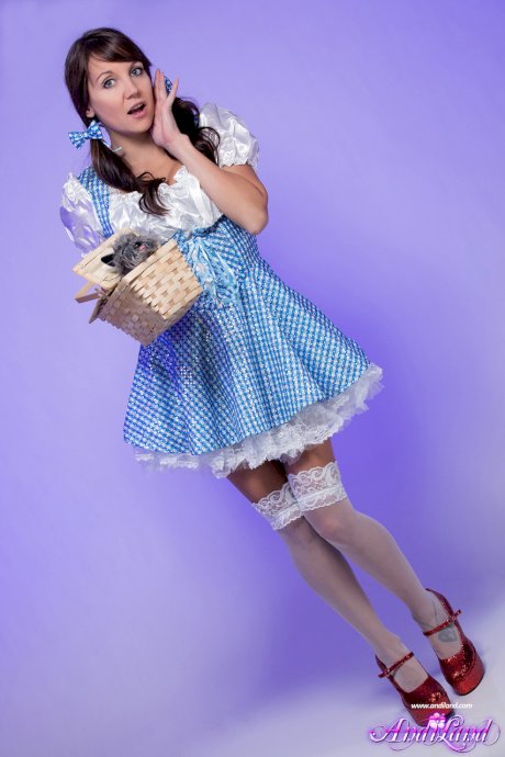 Nice young girl Andi Land looses her tits and pussy from cosplay clothing