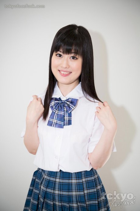 Japanese schoolgirl in socks and skirt chokes on a cock during a face fucking