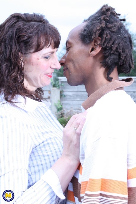 Horny British mature Toni Lace kisses a black dude and rides his huge boner