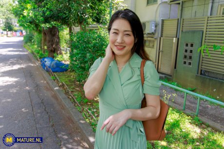 Japanese wife Megumi Satuki kisses her husband goodbye before sex with a boy