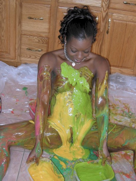 Ebony amateur Anastasia covers her hot body with paint in the kitchen