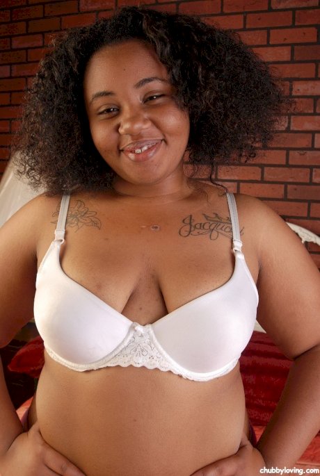 Stunning curly-haired ebony Champagne is showing off her tiny boobs