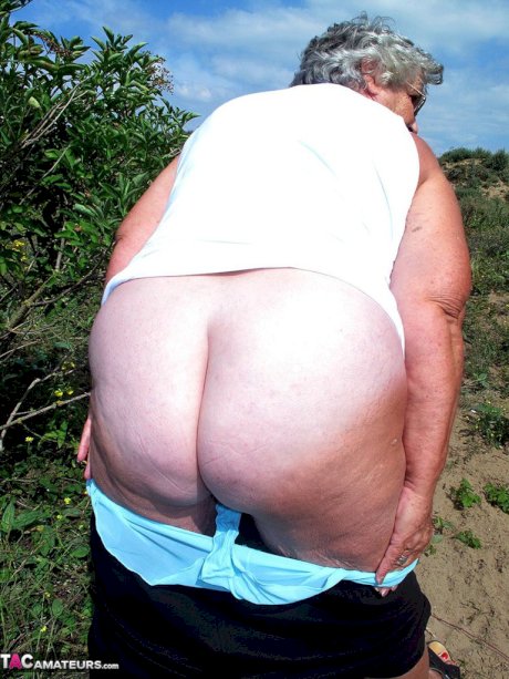 Fat British nan Grandma Libby gets completely naked while out in nature