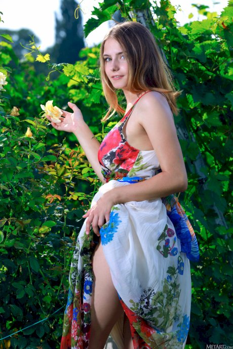 Big titted teen Dakota Pink strips her wonderful dress & poses naked outdoors