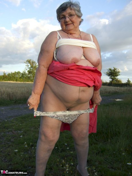 Obese oma Grandma Libby exposes her huge ass while in a field by a rural road