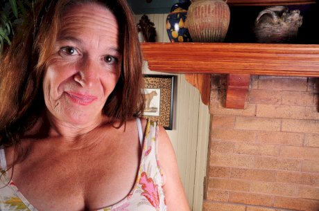Naughty grandmother Anna unzips her dress and pulls down her crotchless hose