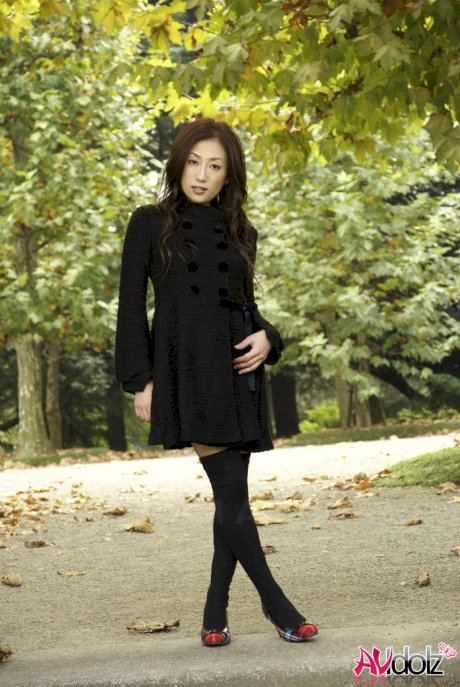 Fully clothed Japanese teen models in the park in black clothes and stockings