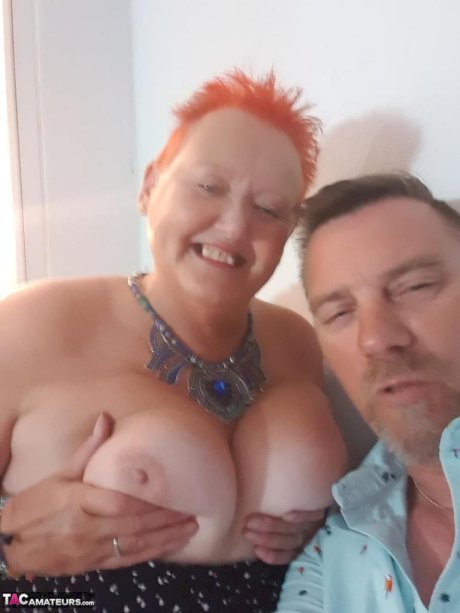 Old SSBBW Val Gasmic dyes her hair red before exposing herself on the beach